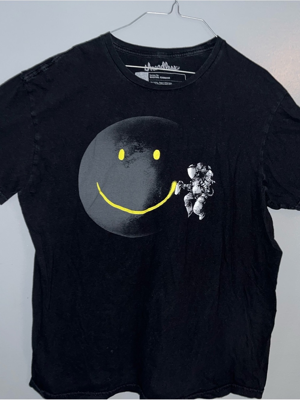 Threadless Black Short Sleeve Tee with Yellow Smiley and White Astronaut